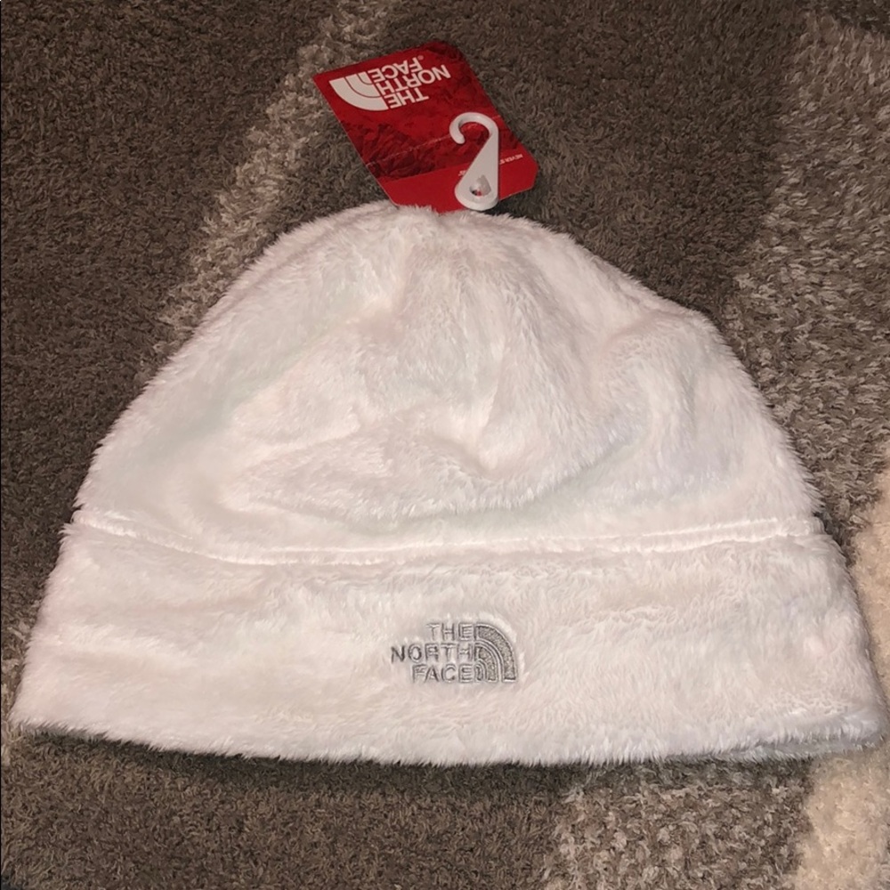 White fuzzy north face beanie
